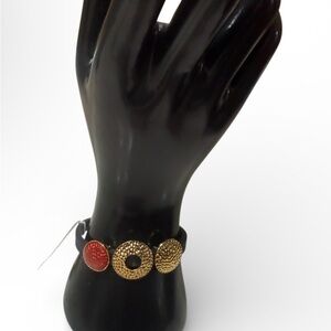 Nina Ricci Gold Tone and Black Rubber Bracelet NWT